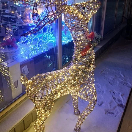 Олень 60см золотой с санями